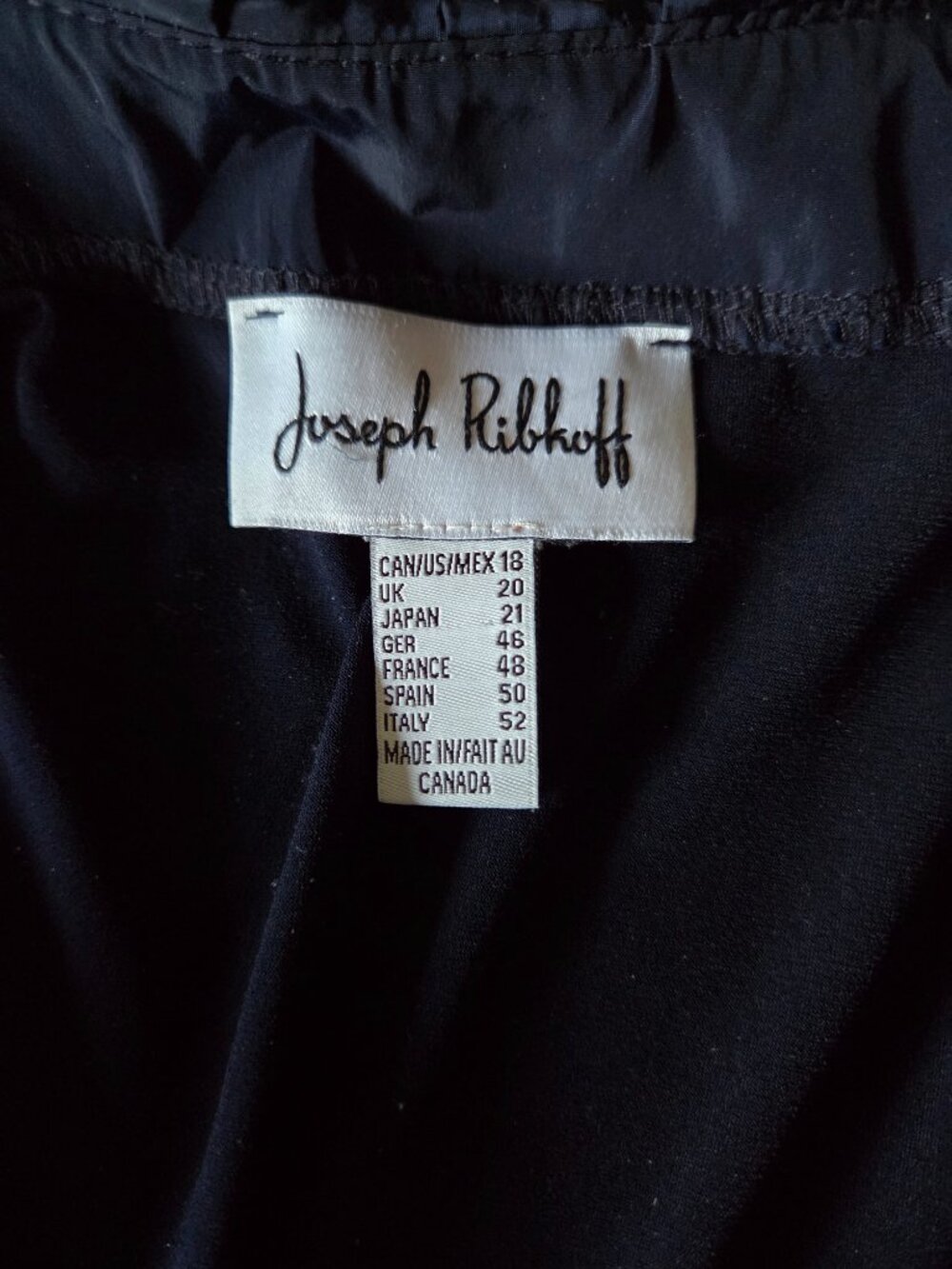 Exquisite Joseph Ribkoff Navy Ruffle Faux Wrap Top - Picture 2 of 7